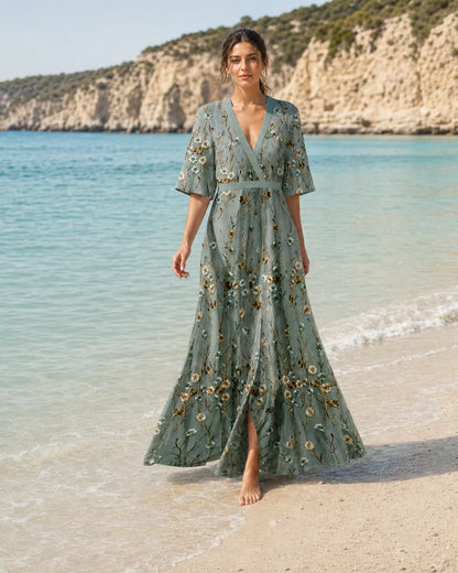Fiorella sage green floral maxi dress worn on the beach