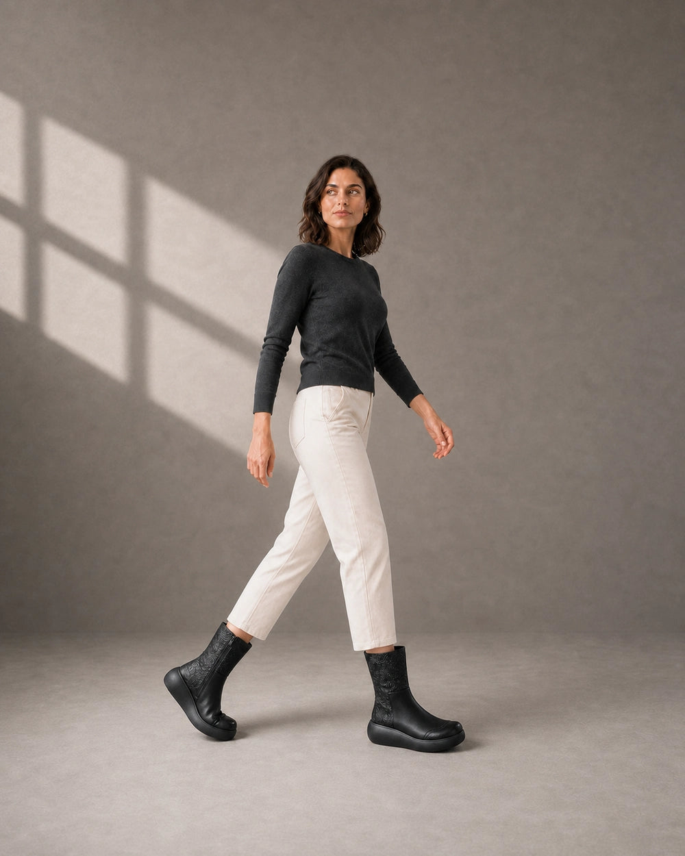 Vintage Embossed Platform Ankle Boots, black movement. — beverly-black-06-movement.webp