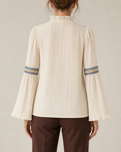 Women's ivory vintage blouse, rear fit view.