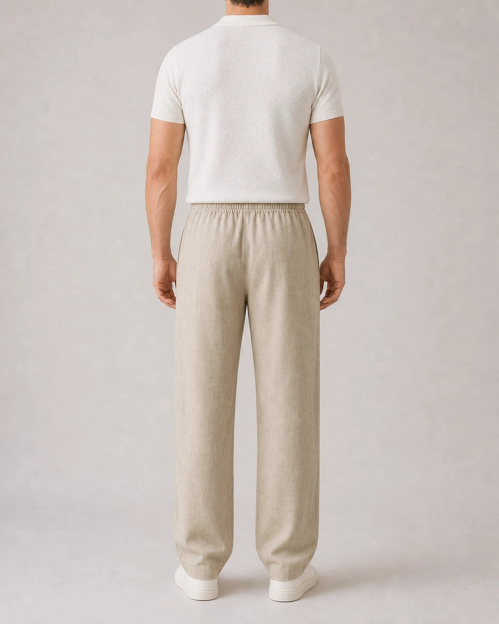 Men’s beige linen wide-leg pants, true rear fit view.