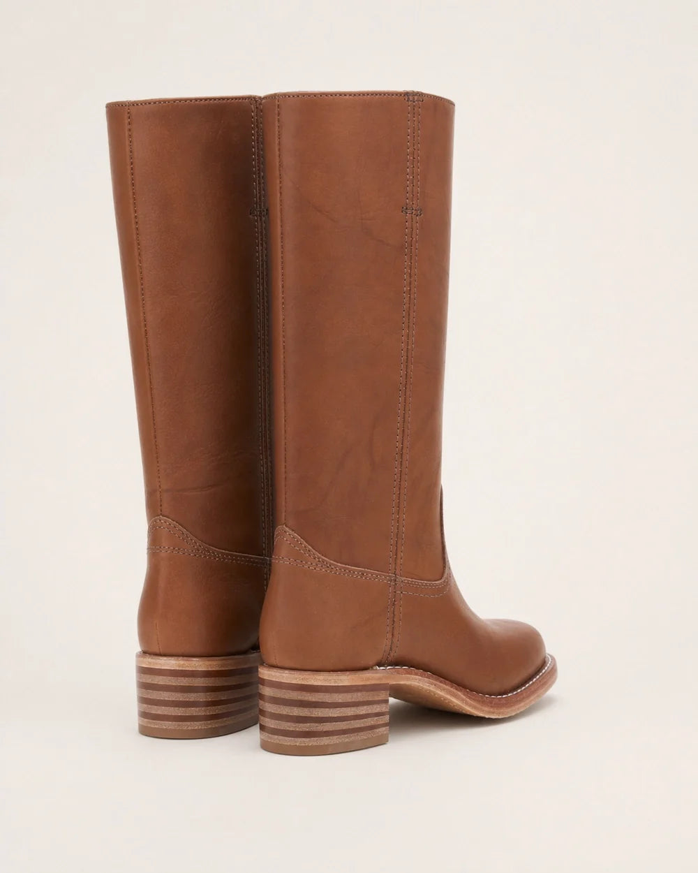 Brown round-toe knee-high boots, rear and profile view