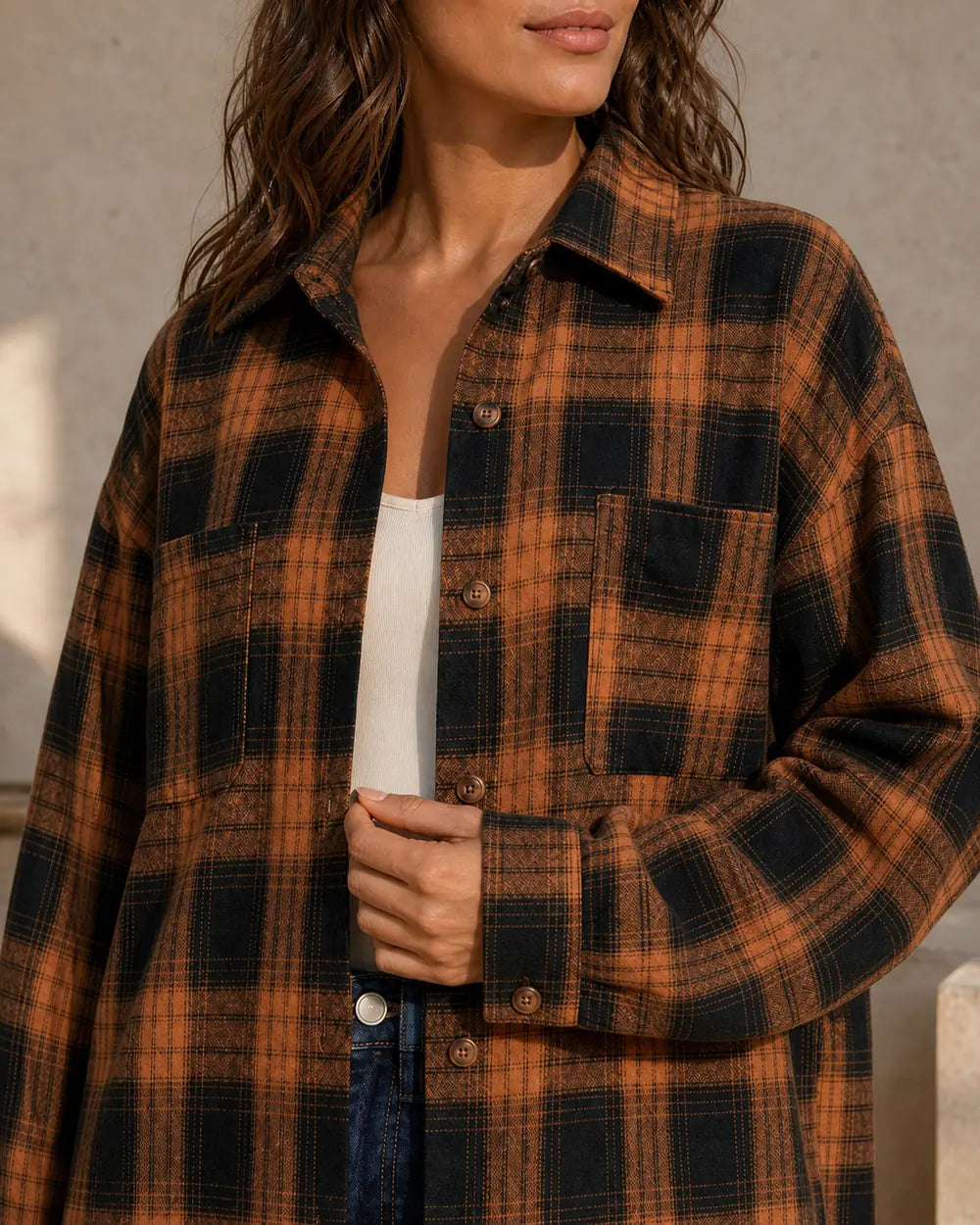 Women's caramel and black plaid shirt, collar, pockets, buttons and cuff detail. — momount-womens-oversized-plaid-shirt-caramel-05-construction-detail.webp