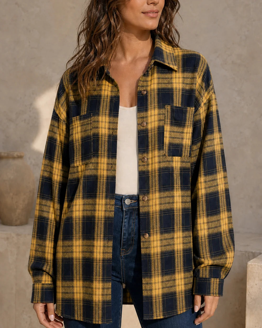 Women's gold and navy oversized plaid shirt, front three-quarter worn view. — momount-womens-oversized-plaid-shirt-gold-11-hero.webp
