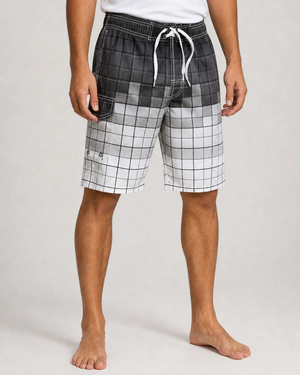 Gray gradient plaid knee-length swim shorts, front view.