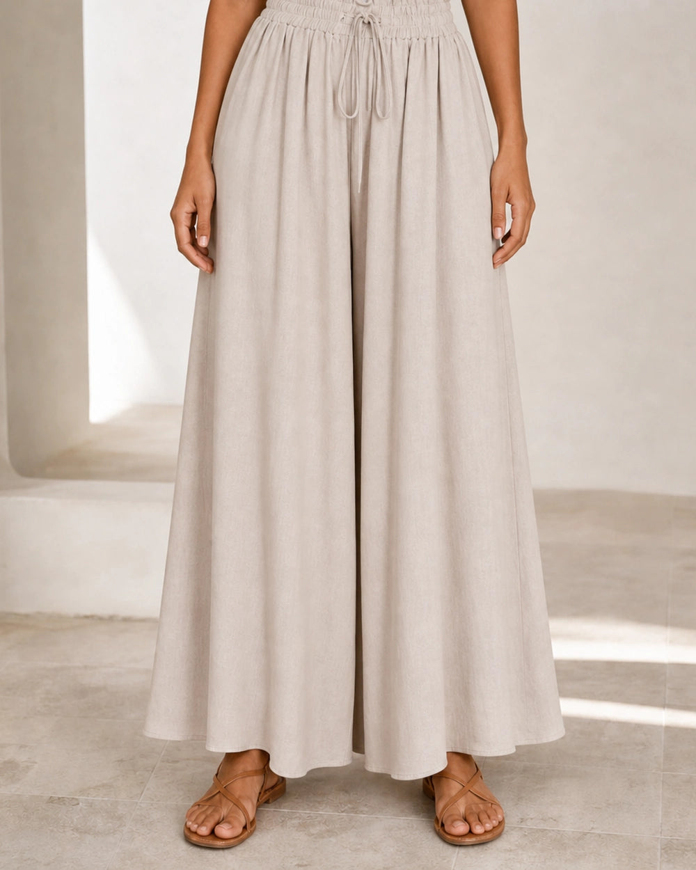 Women's high-waist wide-leg trousers in Apricot, reassurance view. — womens-wide-leg-trousers-apricot-08-reassurance.webp
